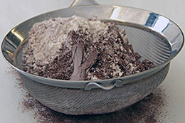 To spread powdered ingredients more effectively through the mix